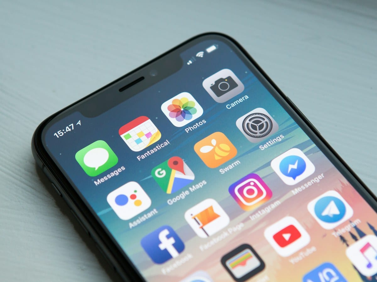 Person testing a mobile app on a smartphone